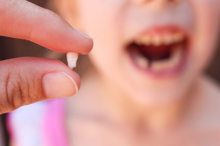 At what age do baby molars fall out?